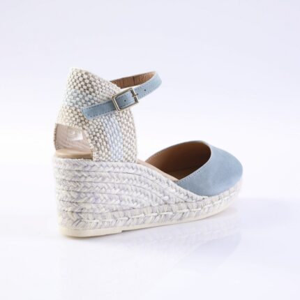 Women’s light blue espadrille wedge sandal with braided jute sole and ankle strap with buckle