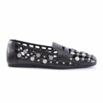 Black perforated ballet flat with a strap, featuring silver studs and a flat sole for casual wear