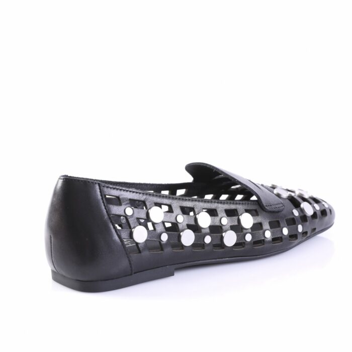Black flat shoe with a cut-out lattice design and silver studs along the sides, low heel visible at the back.