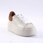 Cream platform sneaker with white laces and brown suede heel patch.