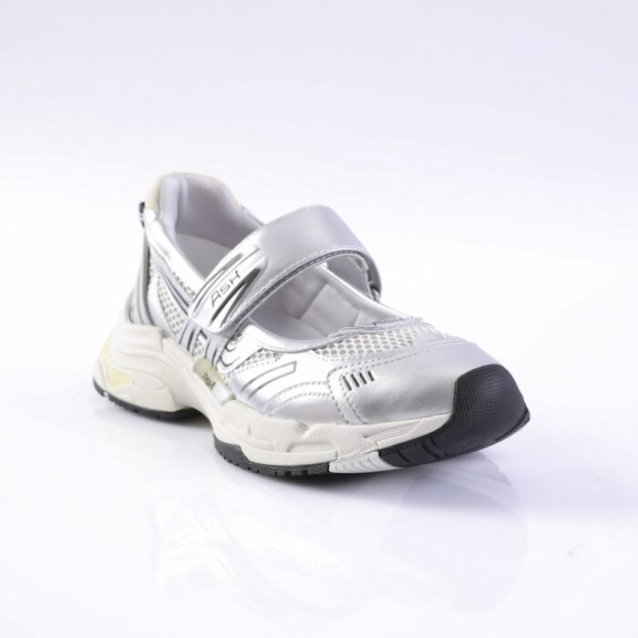 Silver athletic sneaker with a Velcro strap and black toe bumper, chunky white sole.