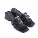 Black leather heeled sandals with multiple straps and a square toe; insole reads Jorge Bischoff.