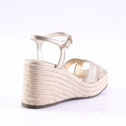 Gold metallic wedge sandal with a braided espadrille heel and ankle strap, shown from the back-left side.