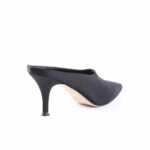 Black satin high-heeled pump seen from the side with a slim stiletto heel and pointed toe (shoe photographed from rear-left angle).