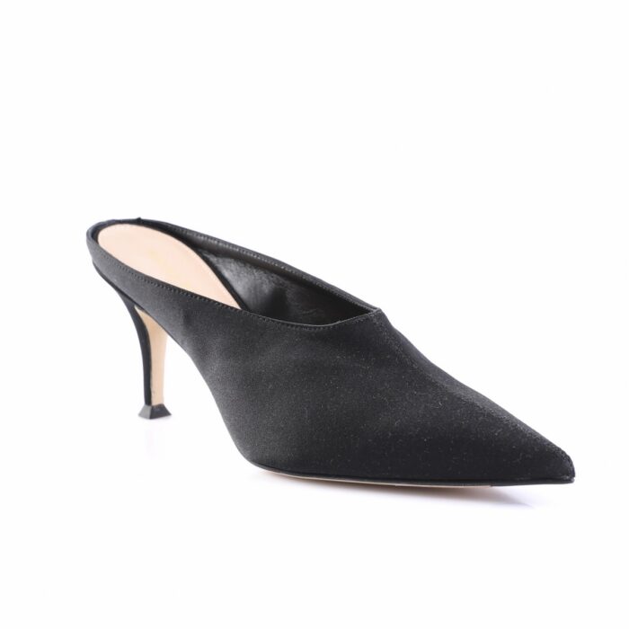 Black suede backless mule with a pointed toe and slender stiletto heel, side view