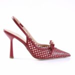 Red lattice-pattern high-heeled pump with a bow at the toe and slingback strap.