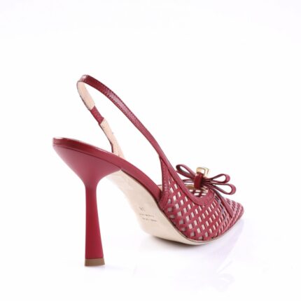 Red lattice-peel slingback stiletto shoe with bow detail and beige sole.