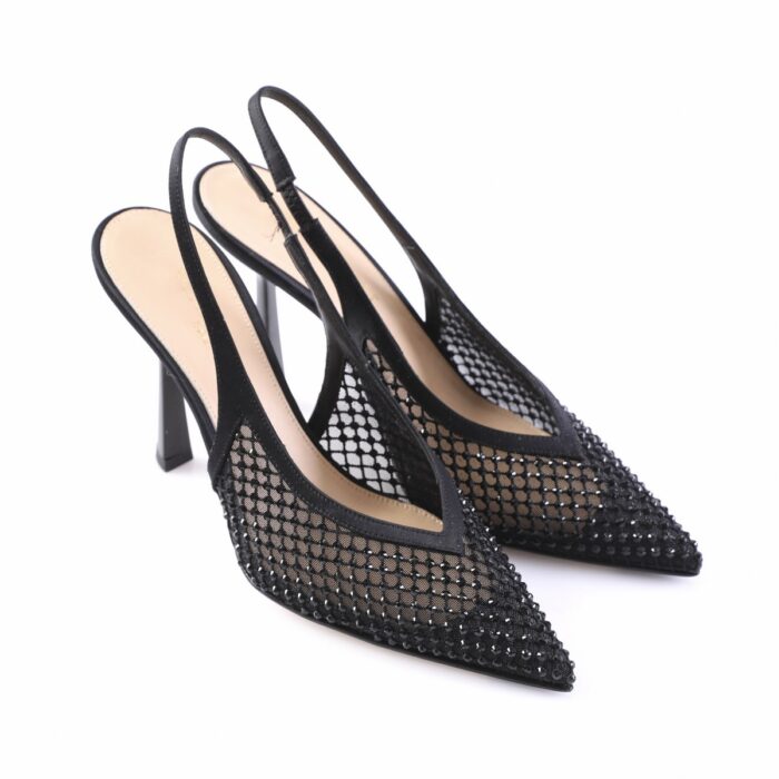 Black mesh slingback stiletto pumps with pointed toes, showcasing rhinestone detailing and beige interior lining
