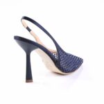 Navy blue high-heeled sandal with a woven front and slim slingback strap, viewed from the back-left side.