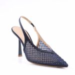 Navy blue slingback high heel with a pointed toe and perforated lattice design.