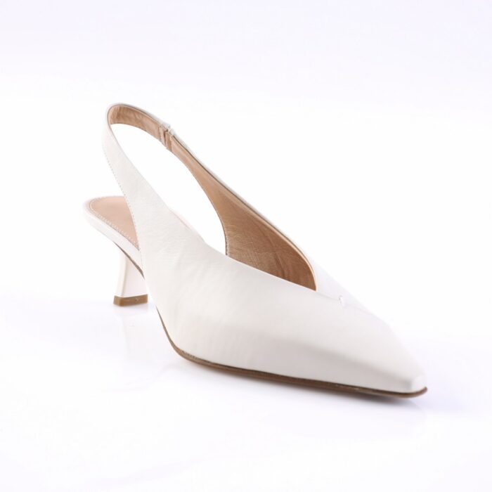 White slingback high-heeled pump with a pointed toe and tan sole, shown from a side-front angle.