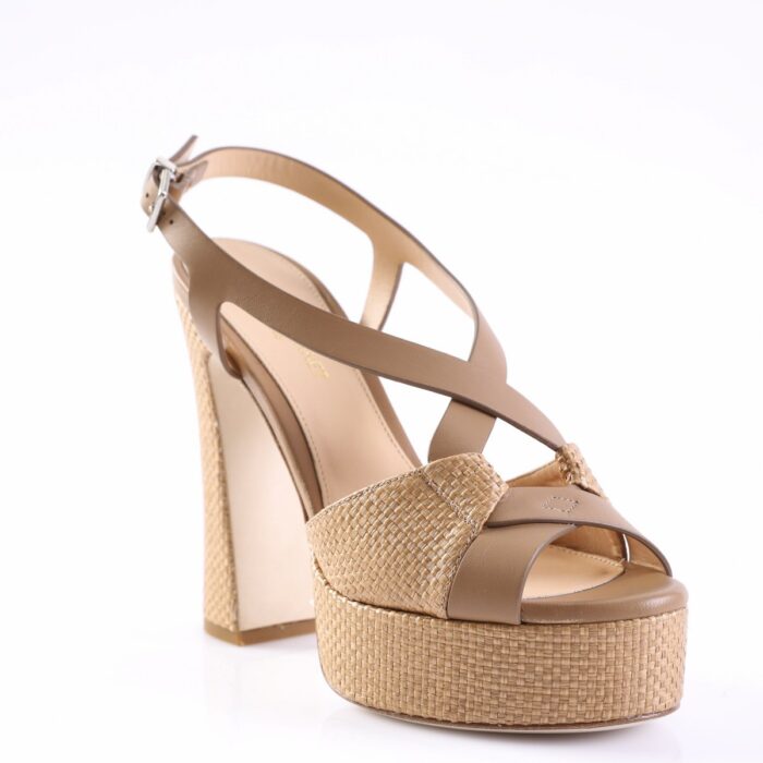Beige open-toe platform sandal with a woven espadrille wedge and cross straps.