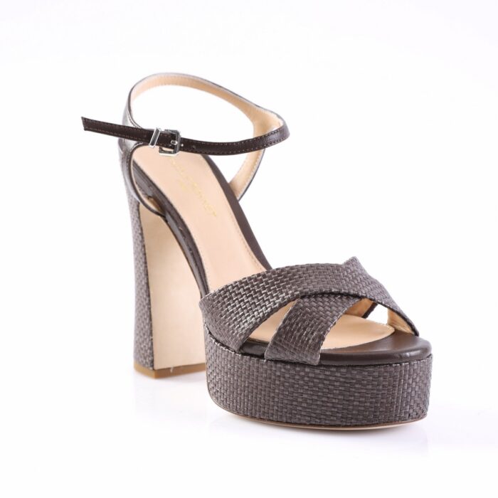 Brown braided platform sandal with ankle strap and chunky heel.