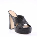 Black woven platform mule sandal with a thick block heel and crossed wide straps, open toe.