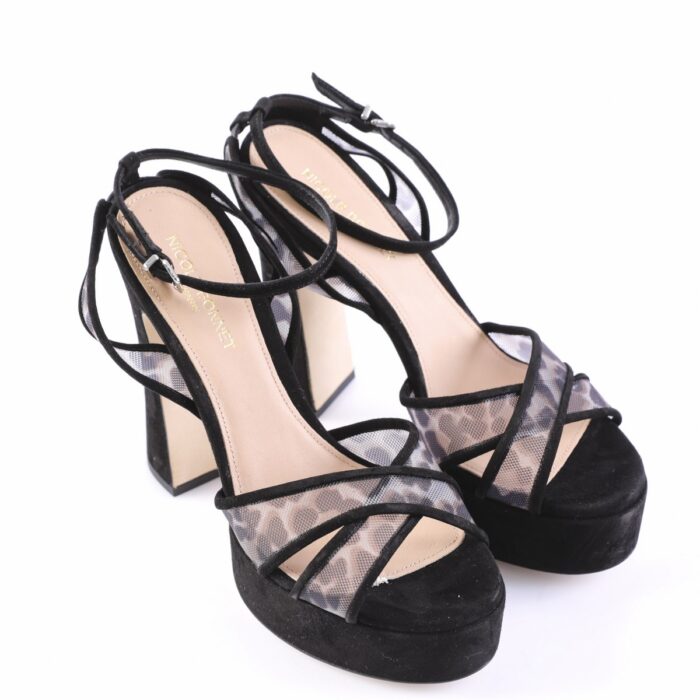 Black high-heeled platform sandals with multiple thin straps and mesh detailing.
