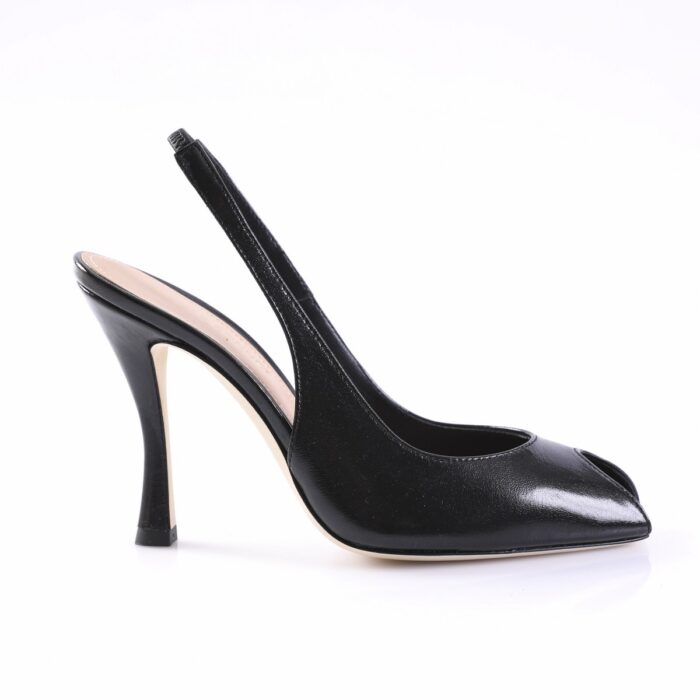 Black patent-leather slingback pump with a pointed toe and tall stiletto heel, facing left