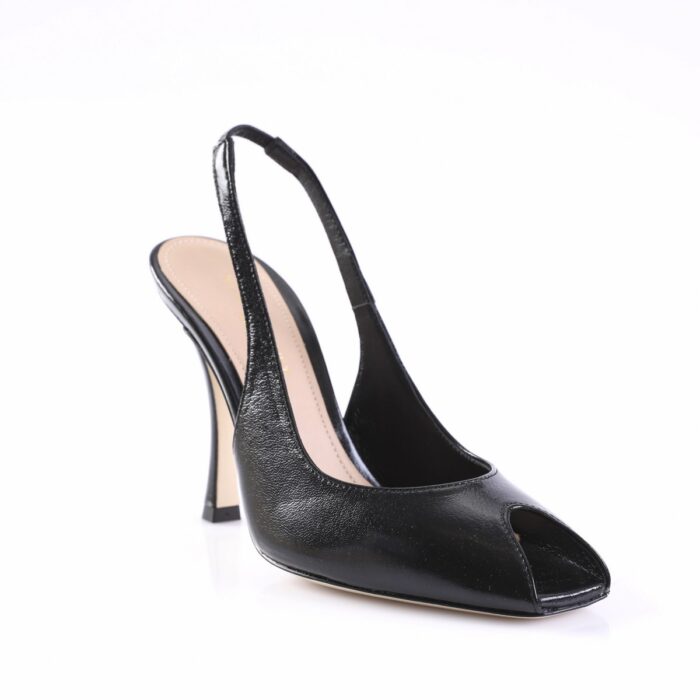 Black patent slingback high-heeled shoe with open toe and beige insole.