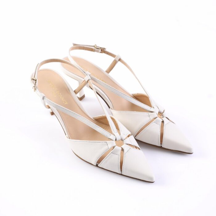 White slingback high-heeled sandals with pointed toes and cutout design