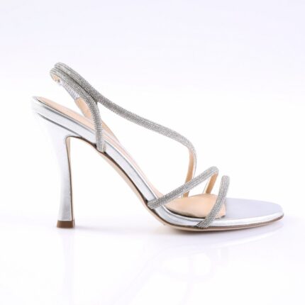 Silver strappy sandal with rhinestone straps and a slender heel on a white background.