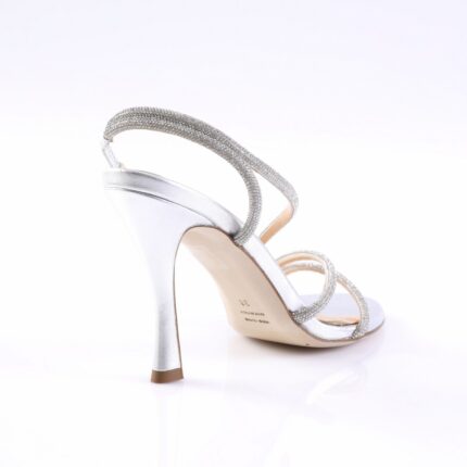 Silver high-heeled sandal with rhinestone-embellished straps, photographed from the back/side angle.