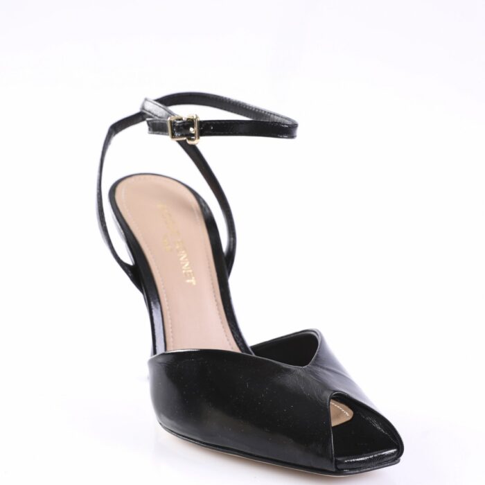 Black patent open-toe sandal with ankle strap and buckle on a white background, side view.