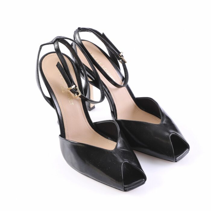 Black patent open-toe slingback high heels with ankle straps and gold buckle on light insoles.