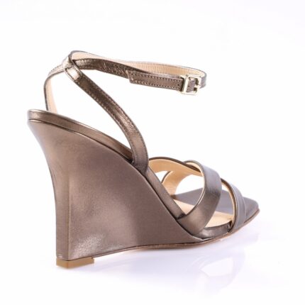 Bronze metallic wedge sandal with ankle strap, side view.