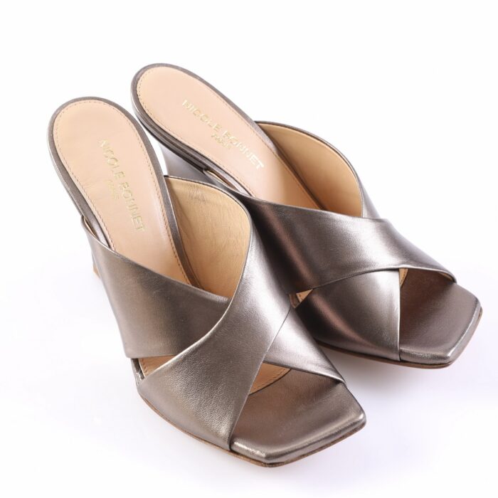 Metallic bronze open-toe wedge sandals with crossed wide straps on a white background, women's footwear