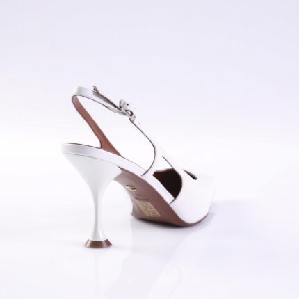 White satin high-heeled sandal with an ankle strap, photographed from the back on a glossy surface.