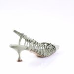 Green strappy heeled sandal with a sculpted small heel, shown from the side.