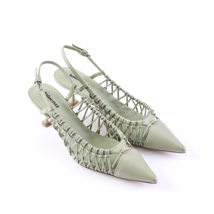 Sage green pointed-toe slingback heels with woven lattice sides (pair of women's sandals).