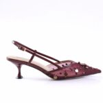 Maroon pointed-toe sandal with decorative beads and a slim slingback strap, kitten heel