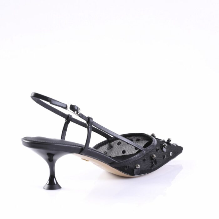Black high-heeled sandal with thin straps and studded toe detail on a white background.