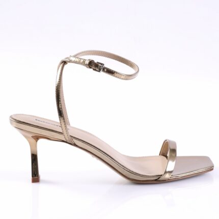 Gold metallic strappy high-heeled sandal with ankle buckle detail.