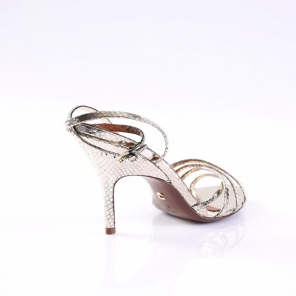 Back view of a metallic silver snakeskin-embossed high-heeled sandal with thin straps.