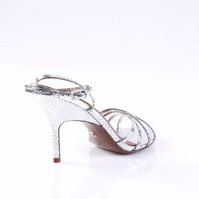 Silver strappy high-heeled sandal with a metallic snakeskin pattern and ankle buckle.