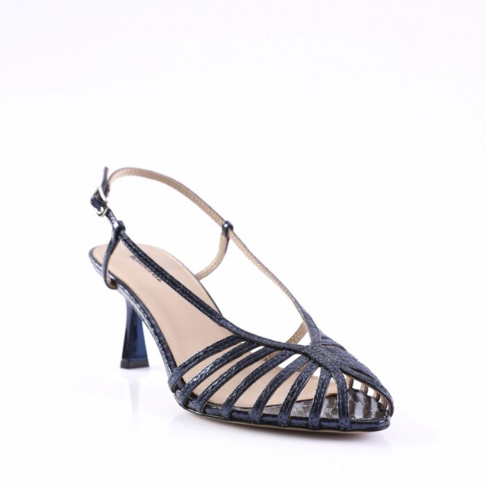 Navy patent strappy sandal with a mid-height, curved heel and beige ankle strap