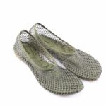 Pair of olive-green mesh ballet flats encrusted with silver rhinestones for a sparkly, decorative look