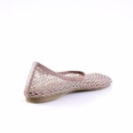 Sparkly pink mesh ballet flat viewed from the side with a beige sole at the bottom edge of the image, front facing right.