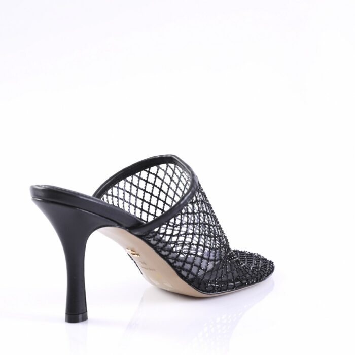Black mesh mule heel with stiletto-style heel and open back, viewed from rear-right side.