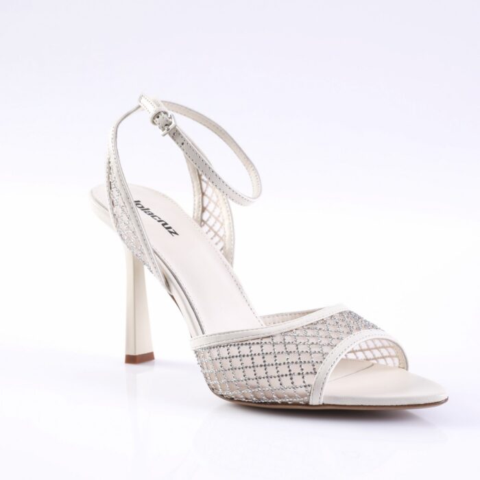 White high-heeled sandal with rhinestone lattice front and ankle strap, stiletto heel.