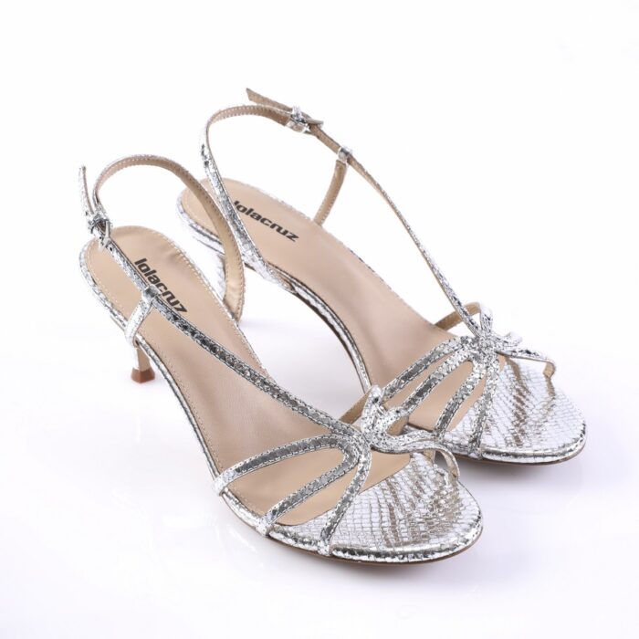 Silver metallic strappy high-heeled sandals with a reptile-skin pattern and open toes