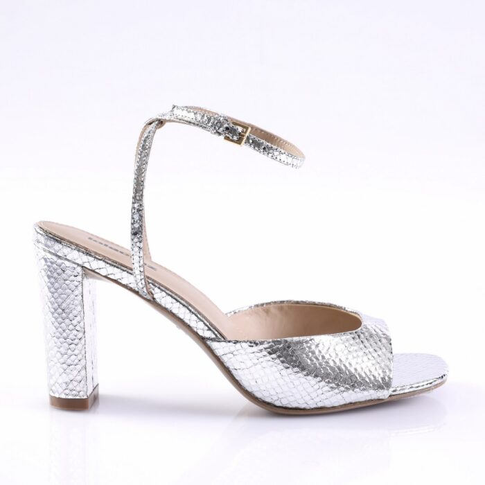 Silver snakeskin-texture high-heeled sandal with ankle strap and block heel, open toe look.