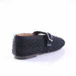 Navy woven loafer viewed from the rear with a metal buckle detail on the side strap.