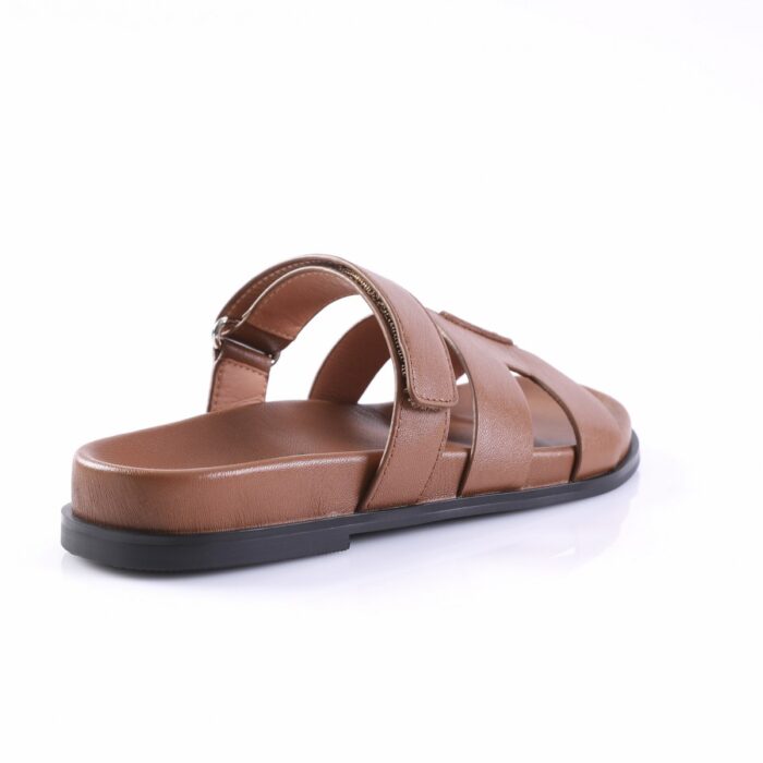 Brown leather sandal with multiple straps and a back strap on a black rubber sole, open-toe design on a white background.