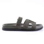 Gray-green suede slide sandal with two wide straps and a cushioned footbed