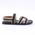 Brown and cream crocheted sandals with two straps and a black sole for casual wear.