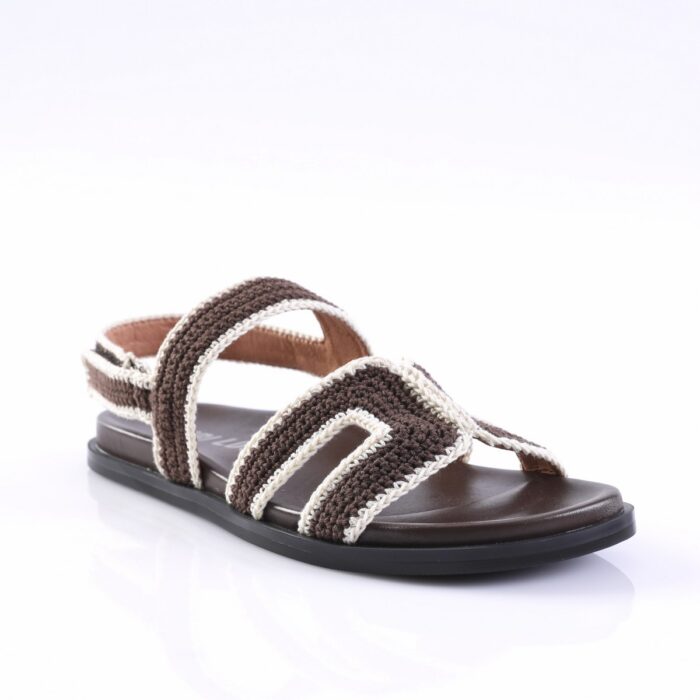 Open-toe, brown and cream crocheted strappy sandal with a black sole on a white background.