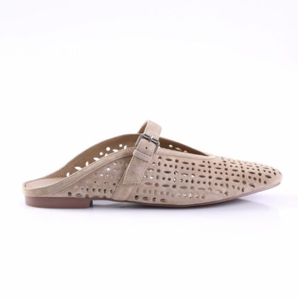 Beige perforated flat mule with a t-strap and buckle, made of suede-looking material.