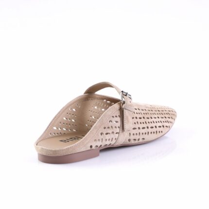 Beige perforated suede mule with a small strap and buckle, low heel.